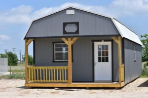 Painted Lofted barn cabins for sale or rent to own in Natchez MS by Blaylock Portable Buildings