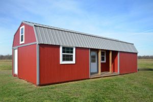 painted side lofted barn cabins for sale or rent to own in Natchez MS by Blaylock Portable Buildings