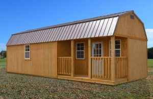 treated wood side lofted barn cabins for sale or rent to own in Natchez MS by Blaylock Portable Buildings