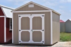 This is a painted utility building for sale or rent to own in Natchez MS by Blaylock Portable Buildings