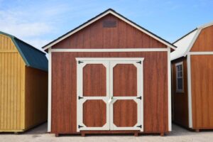 this is a painted utility building for sale or rent to own in Natchez MS by Blaylock Portable Buildings